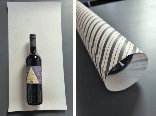 Bottle wrapped as a gift in wrapping paper
