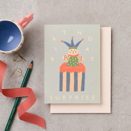 Birthday Surprise jack-in-the-box illustrated card in sage green - kids birthday card - Katie Leamon