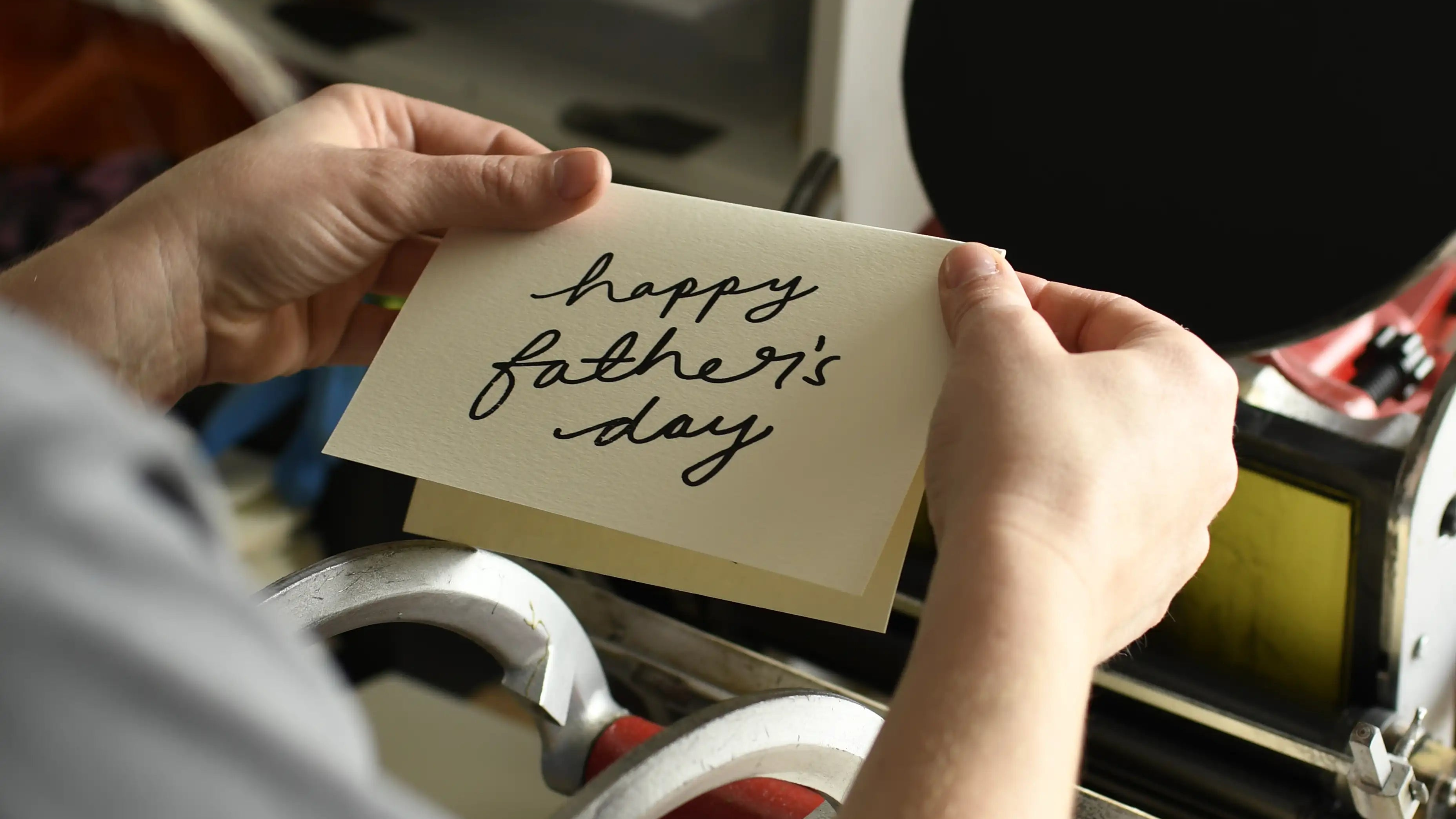 katie leamon hand printing a fathers day card